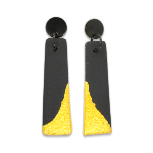 Slim textured black narrowed bar earring on black round stud with dipped gold effect