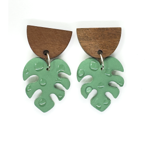 Khaki green drop earrings - monstera leaf polymer clay earring with raindrops. Hanging on half round wooden stud