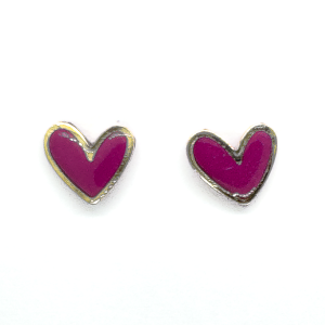 fuchsia coloured heart shaped earrings with a gold band