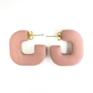 square shaped blush coloured earring made from polymer clay with gold fixing